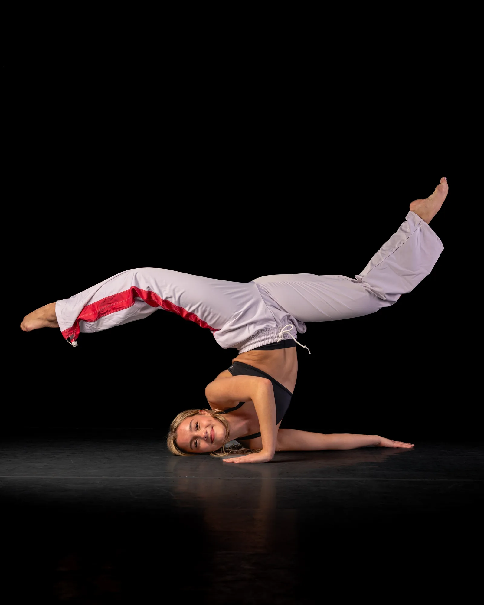 Dancer emphasizing line and movement in the studio.